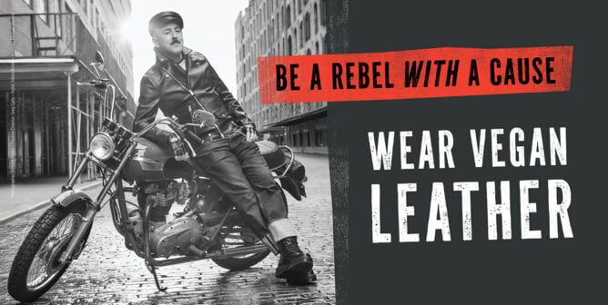 Alan Cumming in vegan leather with slogan "Be a Rebel With a Cause"